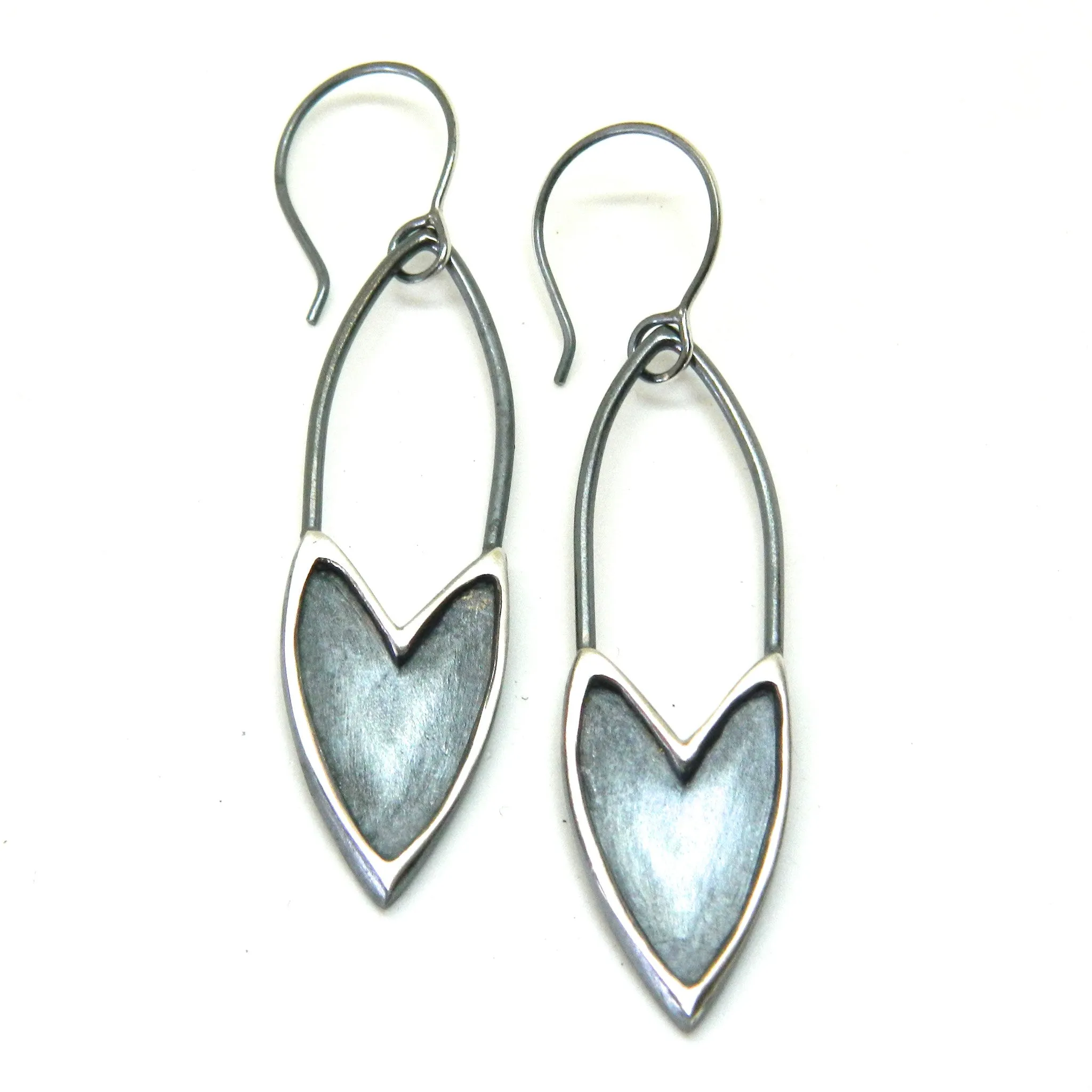 Shielded heart earrings